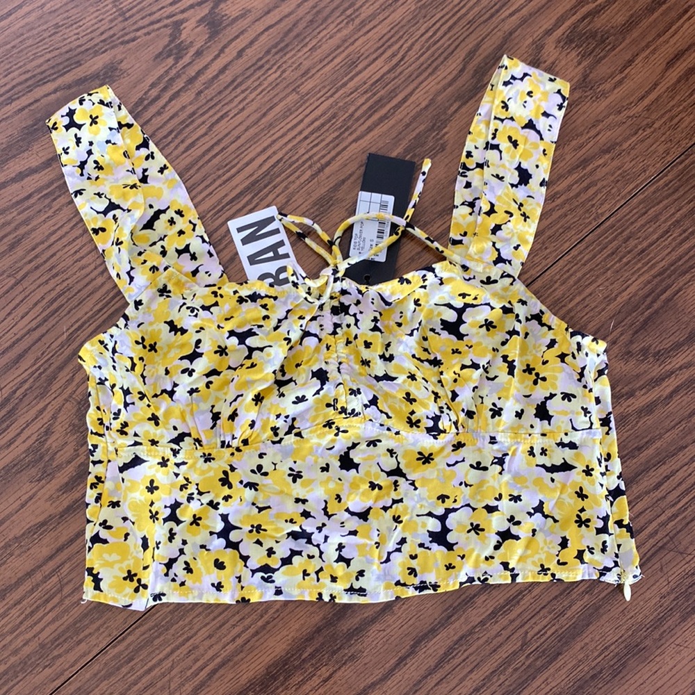 Urban Outfitters crop top! Size Small and the color is yellow, white, and black!